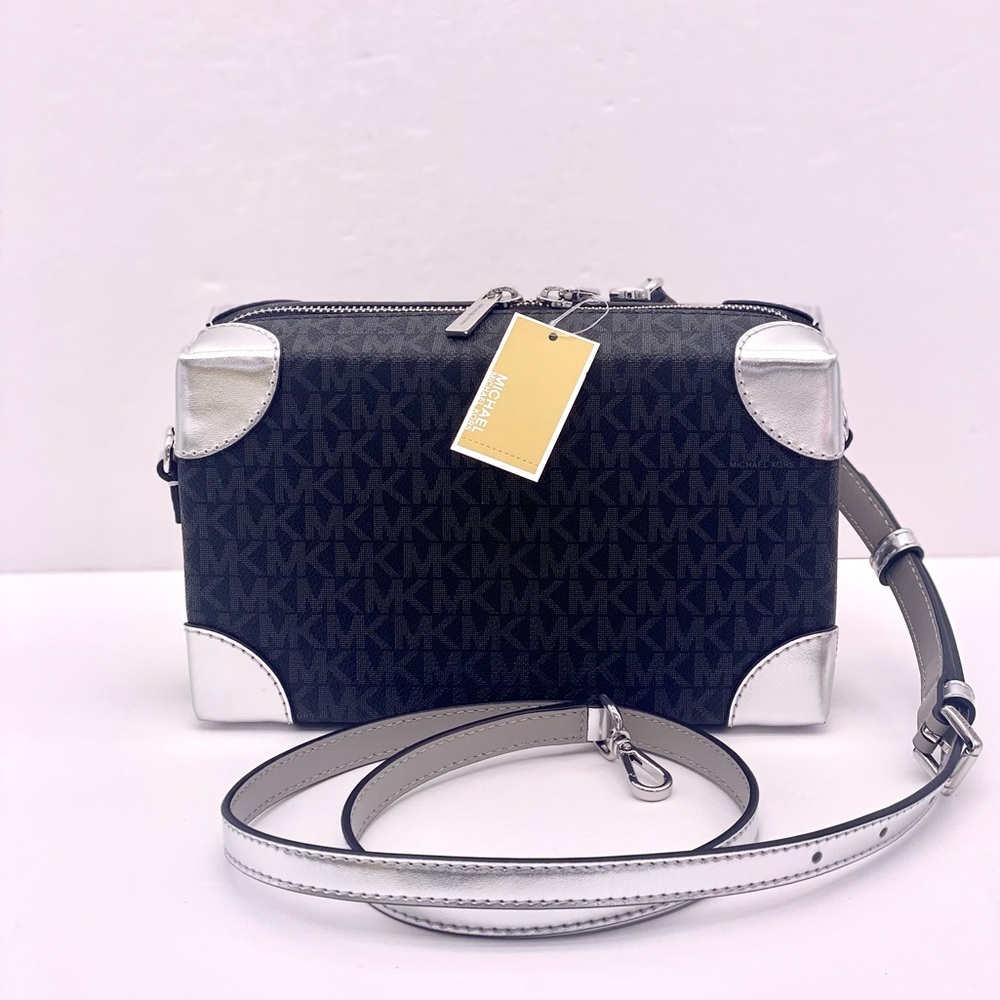Michael Kors Jeanie Small EW Trunk
Crossbody and Wallet Set - Picture 11 of 13